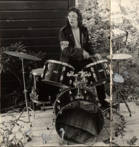 author Stojanovic participates in drumkit therapy session at Cherry Farm following the disastrous Neon Shitcake incident